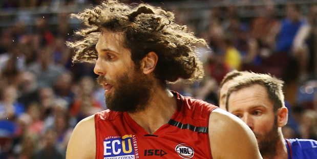 Matthew Knight holds the ball against the Adelaide 36ers. Photo / Getty Images