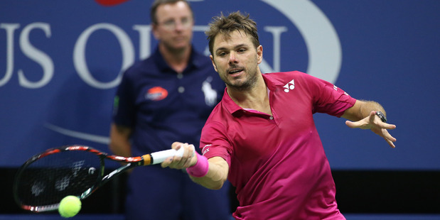 Stanislas Wawrinka in action against Novak Djokovic US Open men's final. Photo / Getty Images