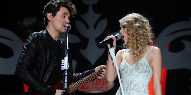 John Mayer and Taylor Swift perform onstage during Z100's Jingle Ball 2009. Photo / Getty