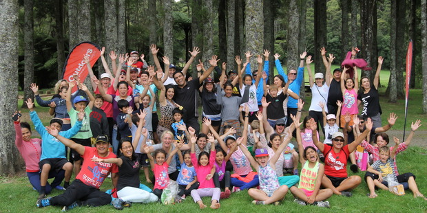 Families at Camp Adair vote with their hands. PHOTO: TORRIE HAZELWOOD