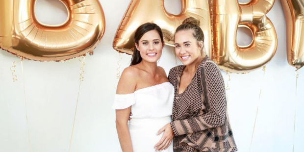 The blogger, left, told Daily Mail Australia that it was totally unplanned - she is not married and she and her partner live in different countries. Photo / Instagram
