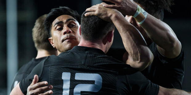 All Blacks centre Malakai Fekitoa embraces midfield partner Ryan Crotty in Hamilton. Photo / Jason Oxenham