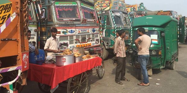 India blog: Trucks at the fruit market in Delhi. Photo/Juliet Rowan