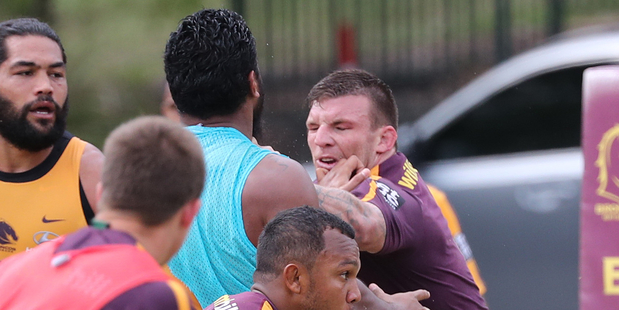 Salesi Funaki and Josh McGuire come to blows. The Brisbane Broncos training at Red Hill. Photo / Peter Wallis
