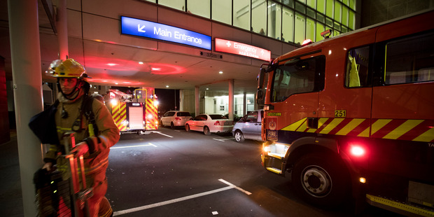 Fire crews attend an alarm at Auckland City Hospital tonight. Photo / Dean Purcell