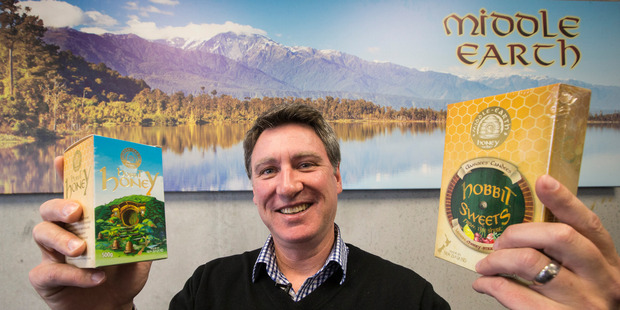 Richard Duncan shows off the new honey products. Photo / Jason Oxenham