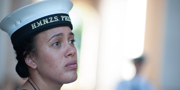 Aleisha MacGregor placed some uniquely Kiwi items at the memorial on which her ancestor's name is inscribed. Photo / NZ Defence Force