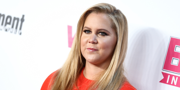 Actress Amy Schumer ended up in the hospital with food poisoning while she was on holiday in Paris. Photo / AP