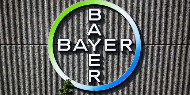 The Bayer AG logo on a building of the German drug and chemicals company in Berlin. Today's deal combines two of the six U.S. and European companies that dominate in agrochemicals. Photo / AP
