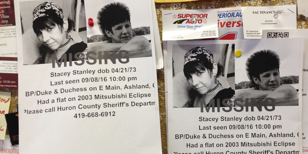 Missing person flyers for Stacey Stanley remain posted on a laundry mat bulletin board. Photo / AP