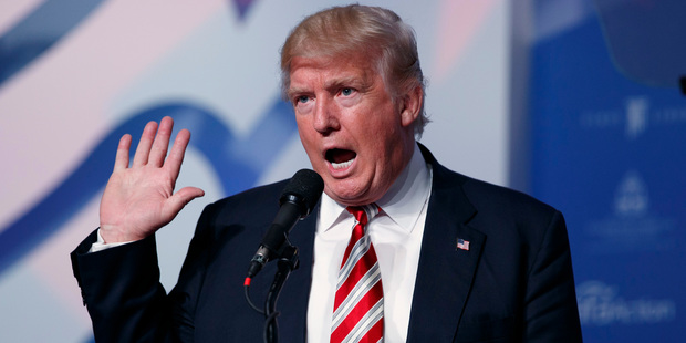 Donald Trump found a way to give away somebody else's money, and claim the credit for himself. Photo / AP