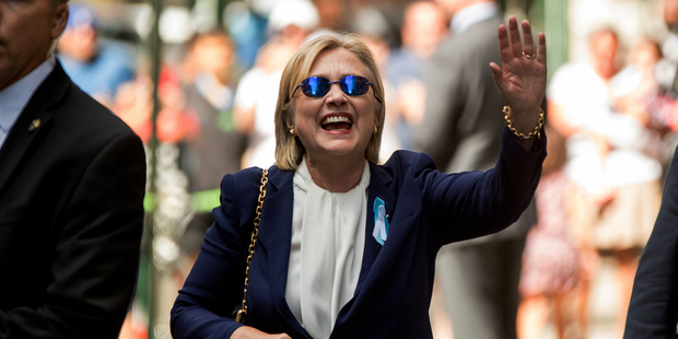 Hillary Clinton left her daughter Chelsea's apartment saying: "I'm feeling great, it's a beautiful day in New York." Photo / AP