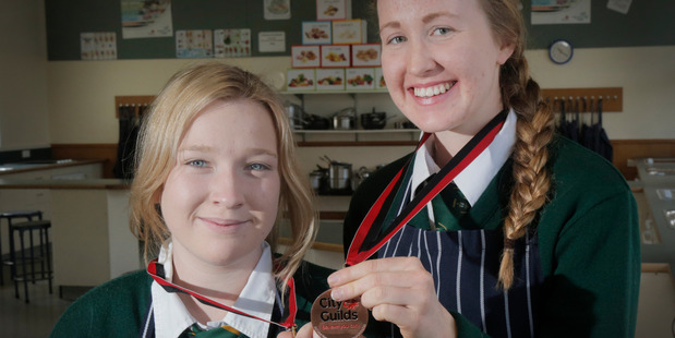CLEVER COOKS: Whanganui High School students Charlotte Taylor (left) and Olivia Caird won a bronze medal at the recent final of the National Secondary Schools Culinary Challenge. PHOTO/BEVAN CONLEY