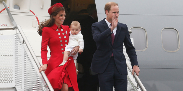 The Duke and Duchess of Cambridge with Prince George disembarking from the RNZAF jet after arriving at Wellington Airport. Photo / Mark Mitchell