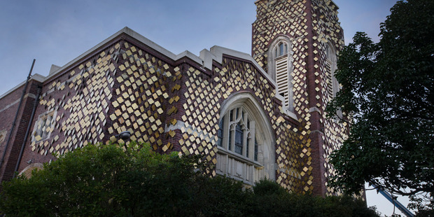 Gold discs have been installed on the St David's Church to commemorate the 100,00 New Zealanders who served overseas in WWI. Photo / Nick Reed