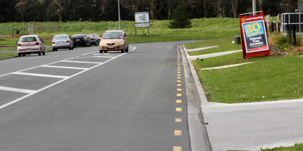 The No Parking lines that have appeared in Kaitaia's North Park Drive are seen by developer Wayne Brown as evidence of one rule for big business, another for the locals.