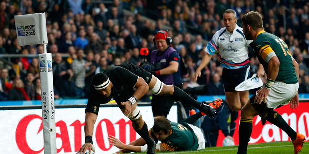 New Zealand's Jerome Kaino dives to score a try at the Rugby World Cup Semi Final, South Africa v New Zealand All Blacks, Twickenham Stadium, London, England. Photo / Paul Thomas - photosport.co.nz