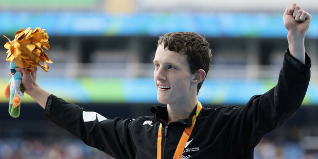 Bronze medalist William Stedman of New Zealand celebrates on the podiuim at the medal ceremony for the Men's 400m. Photo / Getty Images.