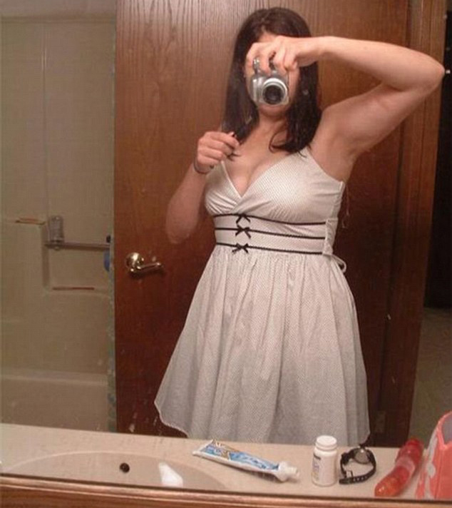 Another intimate object fail, this woman didn't realise that her pink dildo was on display when she posted this selfie online. Photo / Imgur
