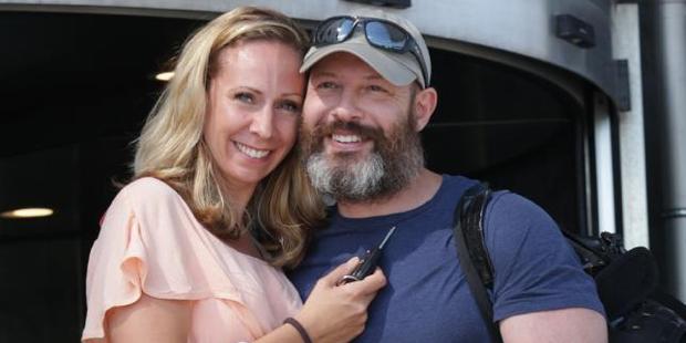 Whittington arrives at Stockholm airport welcomed by his wife Karin after his release from prison. Photo / News Corp Australia