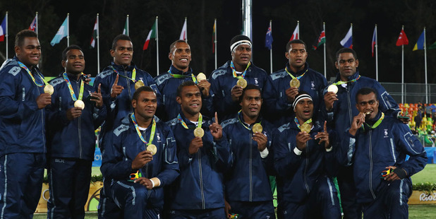 The Fijian rugby sevens team celebrate after winning gold at the Rio Olympics. Photo /Getty