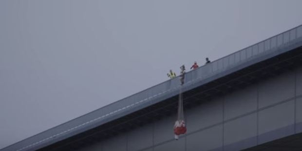 The man had not bothered to put on his leg straps - meaning that when he activated the parachute he would have slid out of the harness and plummeted to his death. Photo / Chris Mcdougall YouTube