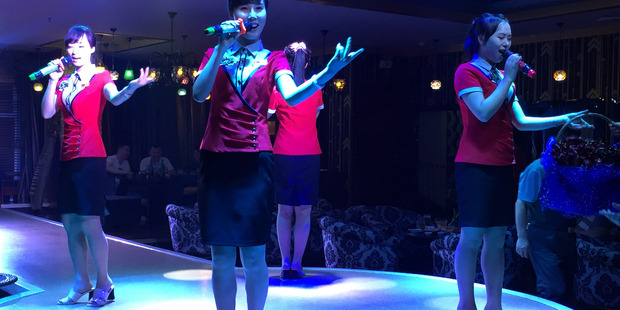 North Korean women perform and serve drinks in the Arirang restaurant in Yanji, northern China, in this 2015 photo. The restaurant is run and staffed by North Koreans. Photo / Washington Post