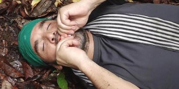 A photographer rests during the treacherous journey through the Darien Gap. Photo / SBS Dateline