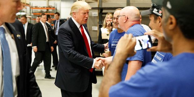 Republican presidential candidate Donald Trump meets workers in Dayton, Ohio. Photo / AP