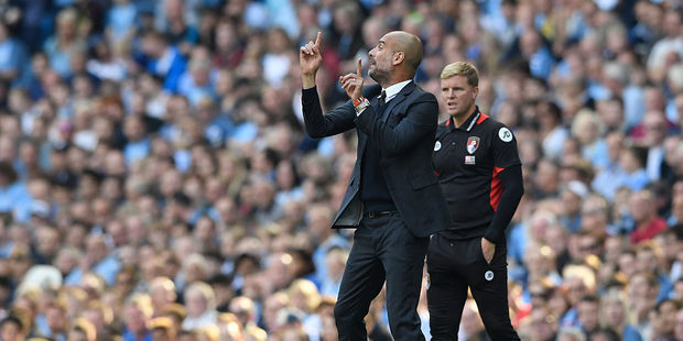 Pep Guardiola, Manager of Manchester City, gives his team instructions during the Premier League match between Manchester City and AFC Bournemouth. Photo / Getty Images
