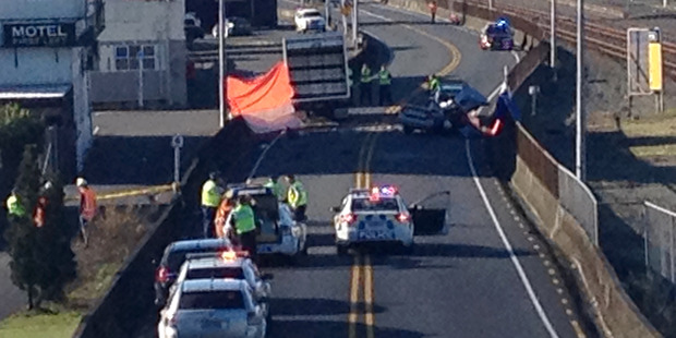 Emergency services on the scene of a triple fatal vehicle accident in Huntly. Photo / Nikki Preston