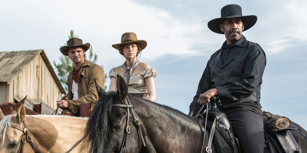 Luke Grimes, Haley Bennett and Denzel Washington in a scene from the film, The Magnificent Seven.