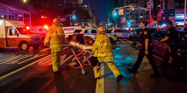Police and firefighters work near the scene of the explosion in Manhattan's Chelsea neighbourhood, in New York. Photo / AP