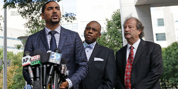 Attorneys Justin Bamberg, Eduardo Curry and Charles Monnett epresenting the family of Keith Lamont Scott. Photo / AP
