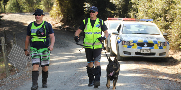 Members of the police team search for Kimble Moore in March.