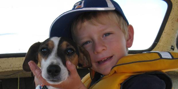 Elliott Stachurski, 9, with the family pet, Possum who has been found. Photo/supplied