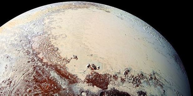 Pluto has an ever-changing climate, covered in nitrogen ice, methane frost and even a giant glacier. Photo / NASA