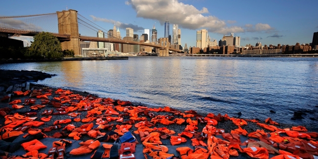 Hundreds of life jackets were placed on the shore of the New York waterfront as world leaders met to highlight the plight of refugees and migrants. Photo / AP