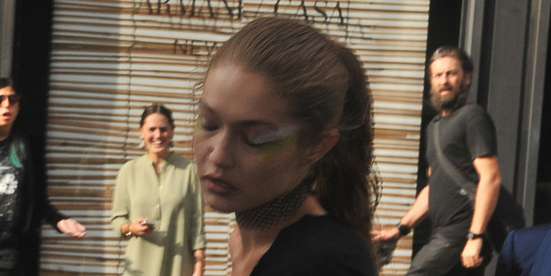 Gigi Hadid looked shaken after the attack as she walked to a car. Photo / Splash