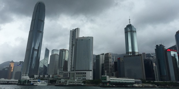 Typhoon Nida had closed down the city. Buildings were boarded up, scores of flights cancelled, schools, shopping malls and markets closed. Photo / Grant Bradley