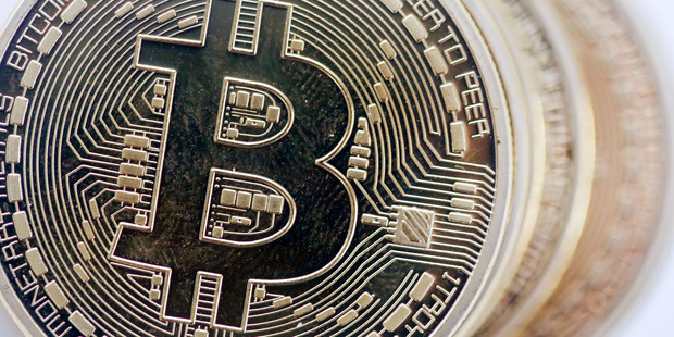 Banks believe bitcoin technology could save them money by cutting out middlemen and making operations more transparent. Photo / Bloomberg