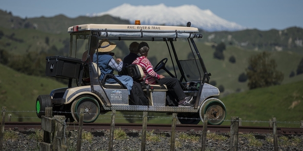 Ian Balme thought why not adapt golf carts for people to ride on the rails, which pass through some of the country's most isolated but beautiful scenery. Photo / Supplied
