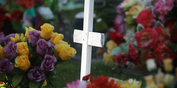 When the bulldozing of plots was discovered in 2013, upset and angry parents of babies buried at the site demanded someone take responsibility. Photo / Greg Bowker