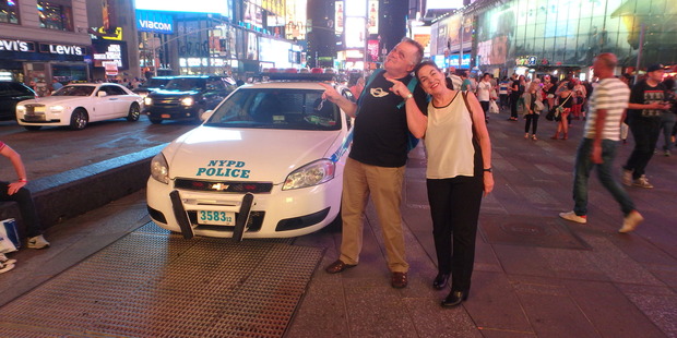 Paul, pictured here with wife Debra-Rose, says he had "a face like a racoon", after tripping on stairs in Chicago.