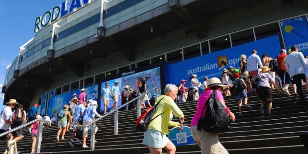 Tennis fans arrive at Rod Laver Arena during day one of the 2016 Australian Open. Photo / Getty Images.