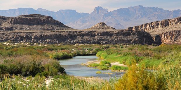 The Rio Grande winds through the desert along the Mexico-Texas Border. Photo / 123RF