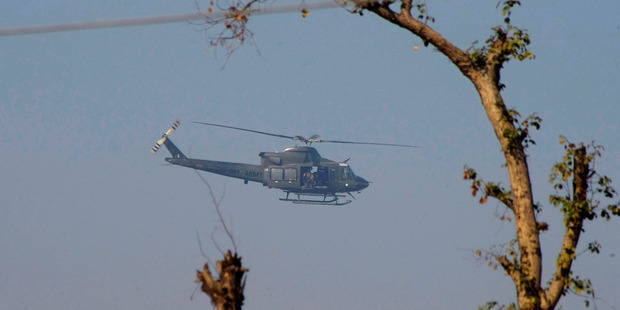 A Pakistan army helicopter flies over the Bacha Khan University. Photo / AP