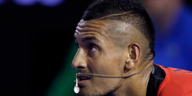 Nick Kyrgios of Australia waits to receive serve from Tomas Berdych of the Czech Republic during their third round match at the Australian Open. Photo / AP.