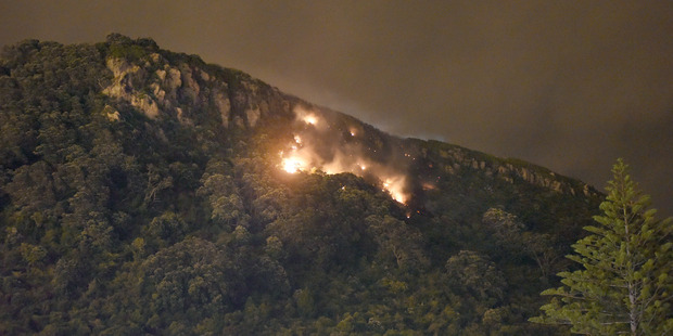 Mauao on fire. Photo/George Novak