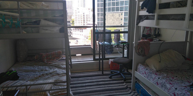 This photo accompanied a Facebook ad for a room-mate to share a master-room with three other people. Photo / Facebook